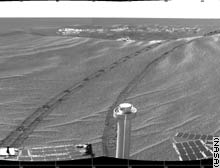 Scientists are busy analyzing Opportunity's new view of the plains of Meridiani Planum.