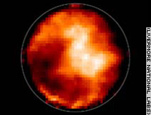 An image of Titan shows dark regions that may be seas of liquid hydrocarbons.