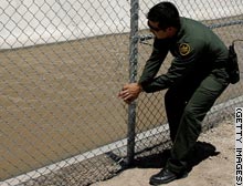 story.immigration.fence.gi.jpg