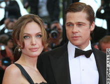 Angelina Jolie and Brad Pitt arrive at the screening of British director Michael Winterbottom's 'A Mighty Heart'